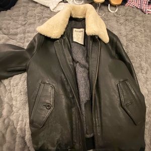 Used Black leather winter jacket. Very warm and stylish.